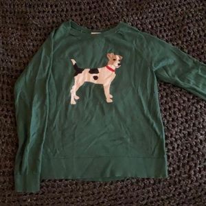 Dark green sweater with dog